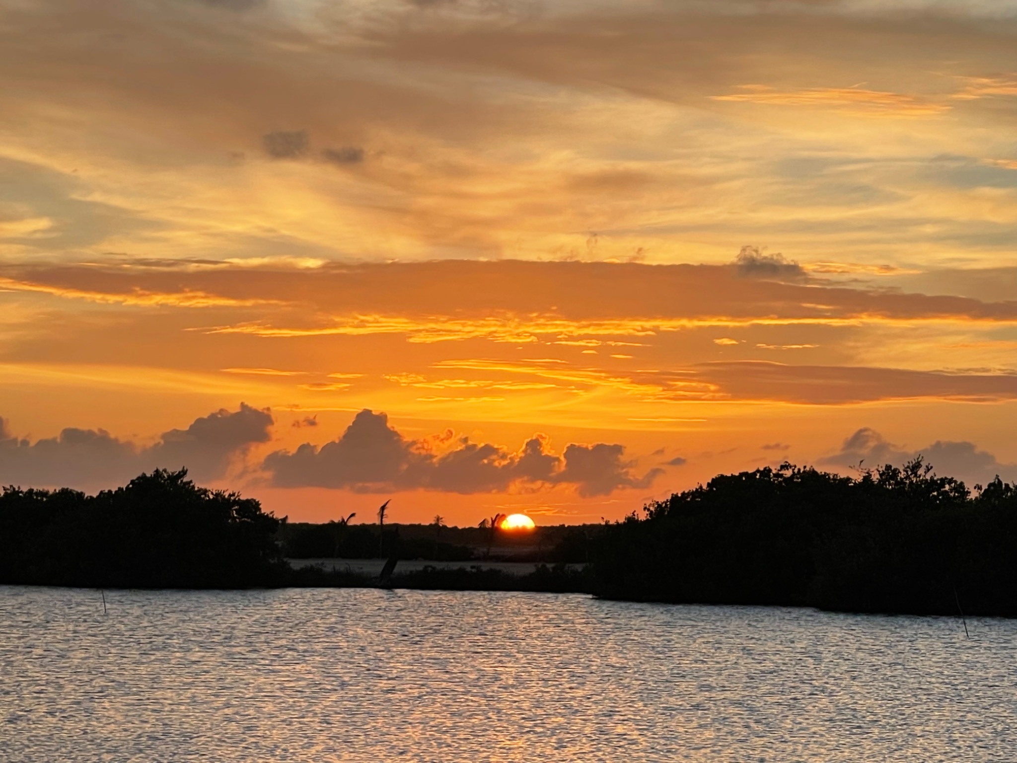 Golden sunset reflected across the lagoon